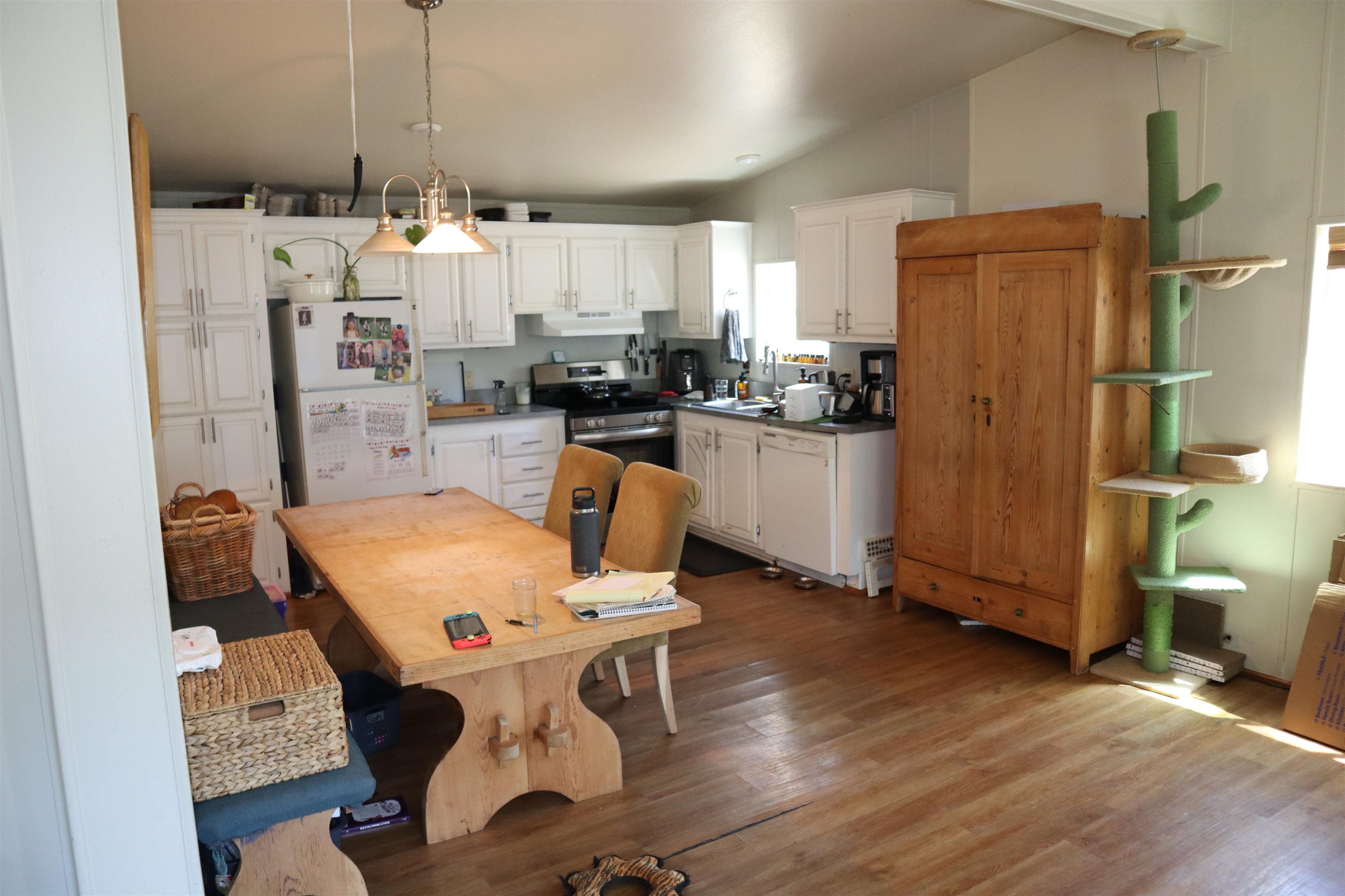 193 Fairground Road Quincy, CA 95971 - Photo 3 of 20 a view of a dining room with furniture window and wooden floor