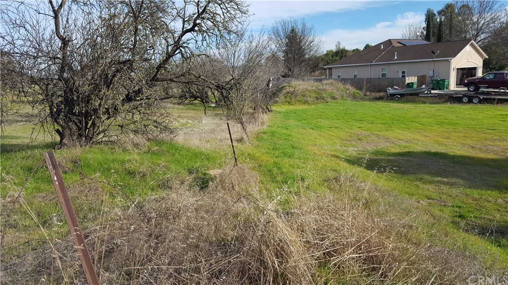 0 Eller Drive Corning, CA 96021 - Photo 5 of 6 a view of house with yard and car parked