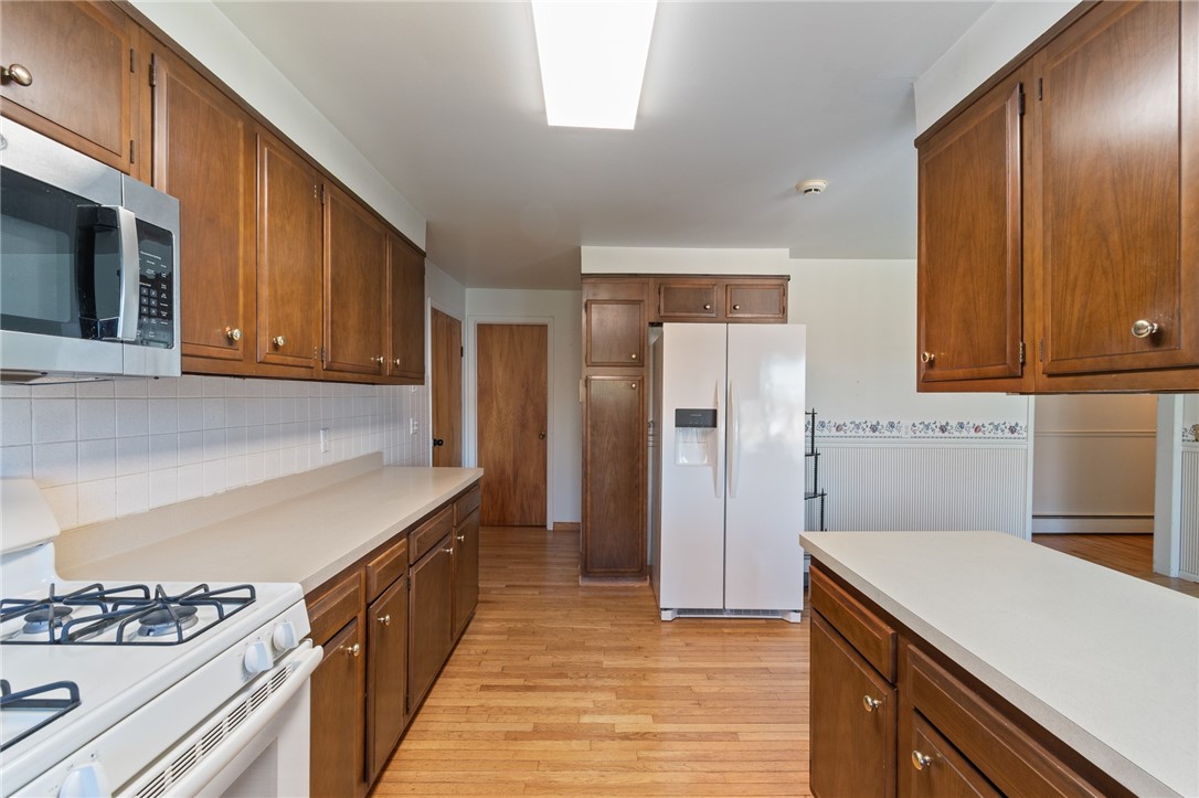 6075 Arbor Road Ontario, NY 14519 - Photo 12 of 27 Door to left goes to garage, straight away to laun