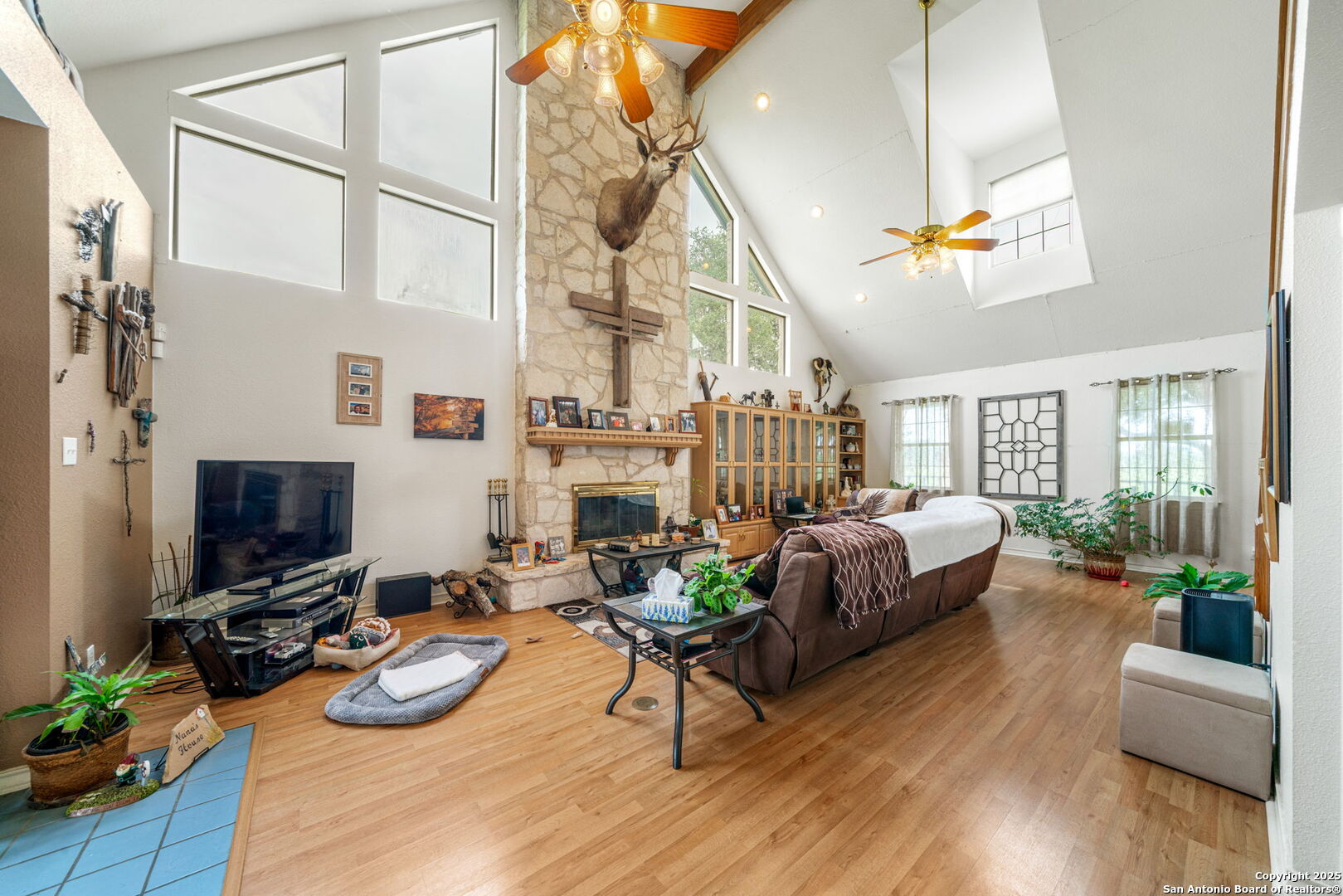 210 Tolle Road Cibolo, TX 78108 - Photo 11 of 61 a living room with furniture fireplace and flat screen tv