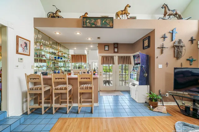 a view of a dining room with furniture wooden floor and a rug