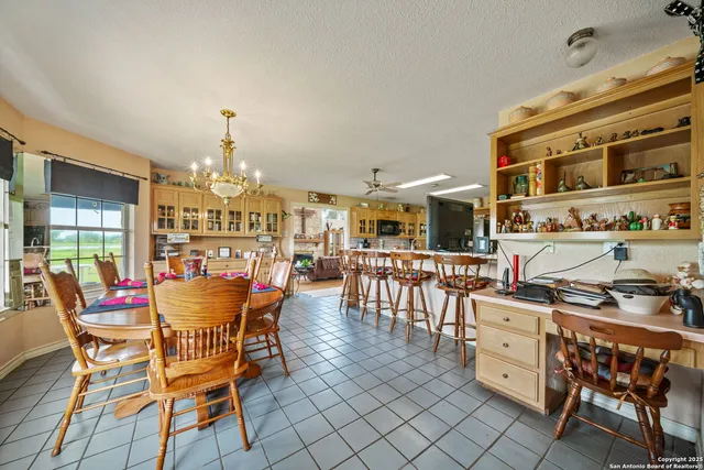 a bedroom with furniture and a wooden floor