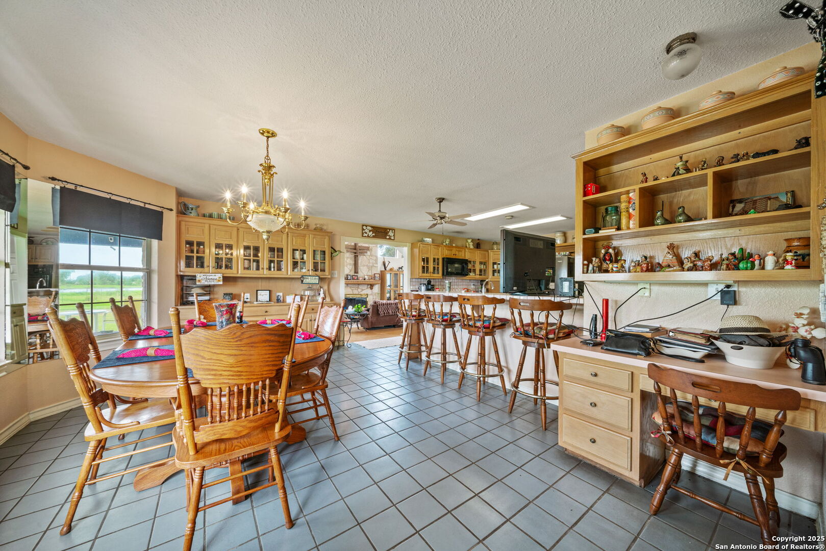 210 Tolle Road Cibolo, TX 78108 - Photo 19 of 61 a dining room with furniture and chandelier