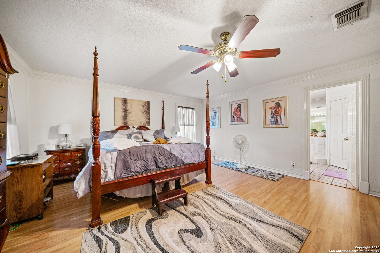 210 Tolle Road Cibolo, TX 78108 - Photo 21 of 61 a bedroom with furniture and a wooden floor