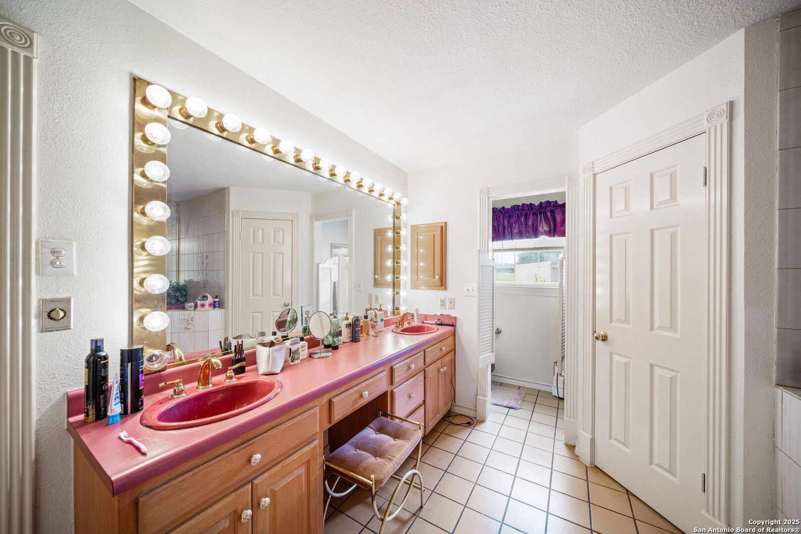 210 Tolle Road Cibolo, TX 78108 - Photo 22 of 61 a very nice looking room with a large mirror a sink and a shower