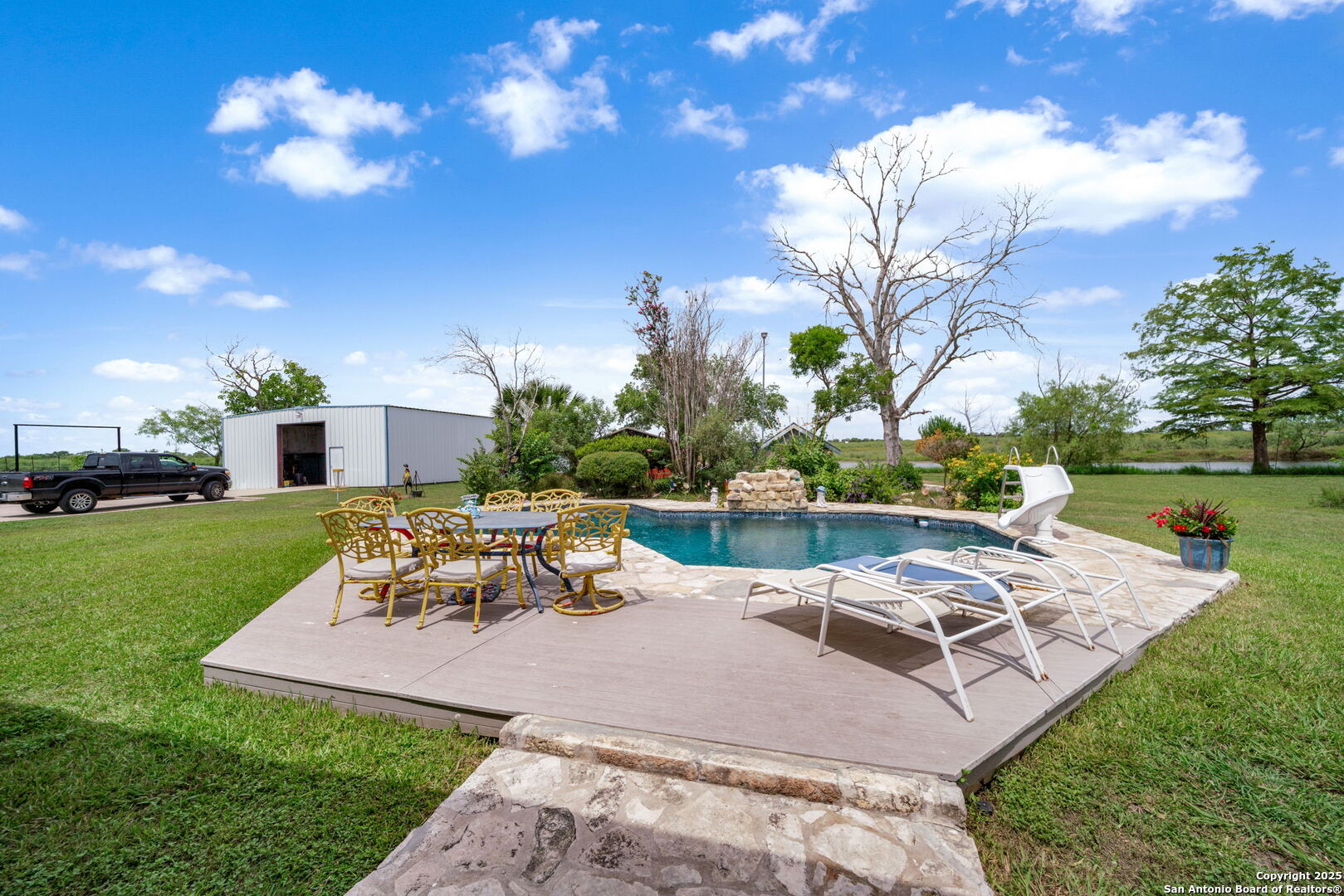 210 Tolle Road Cibolo, TX 78108 - Photo 33 of 61 a view of a house with backyard porch and garden