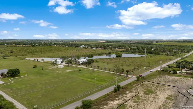 a view of a lake in middle of a city