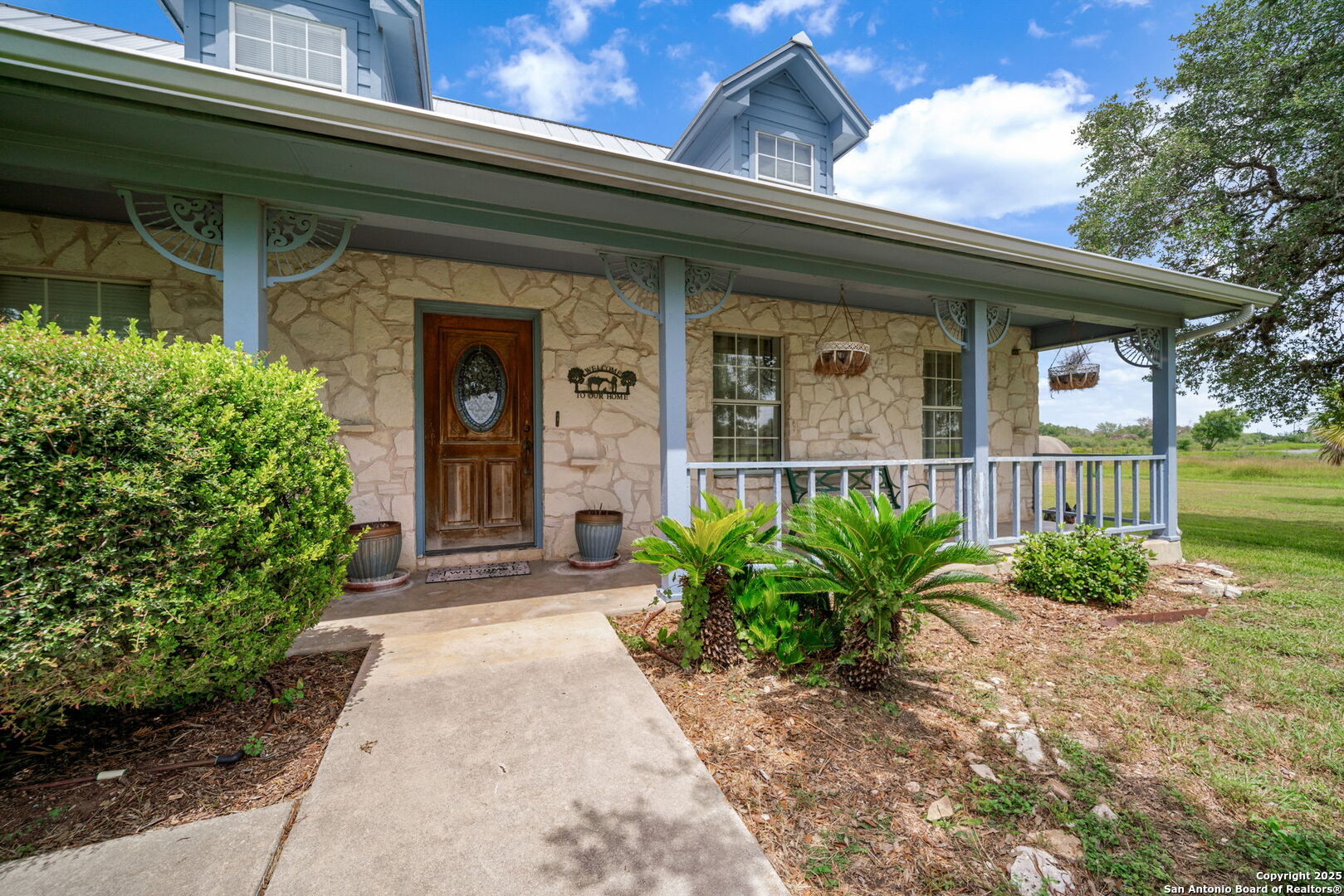 210 Tolle Road Cibolo, TX 78108 - Photo 4 of 61 front view of a house with a large window