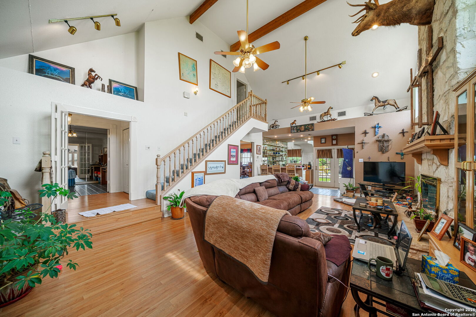 210 Tolle Road Cibolo, TX 78108 - Photo 9 of 61 a living room with lots of furniture and a chandelier