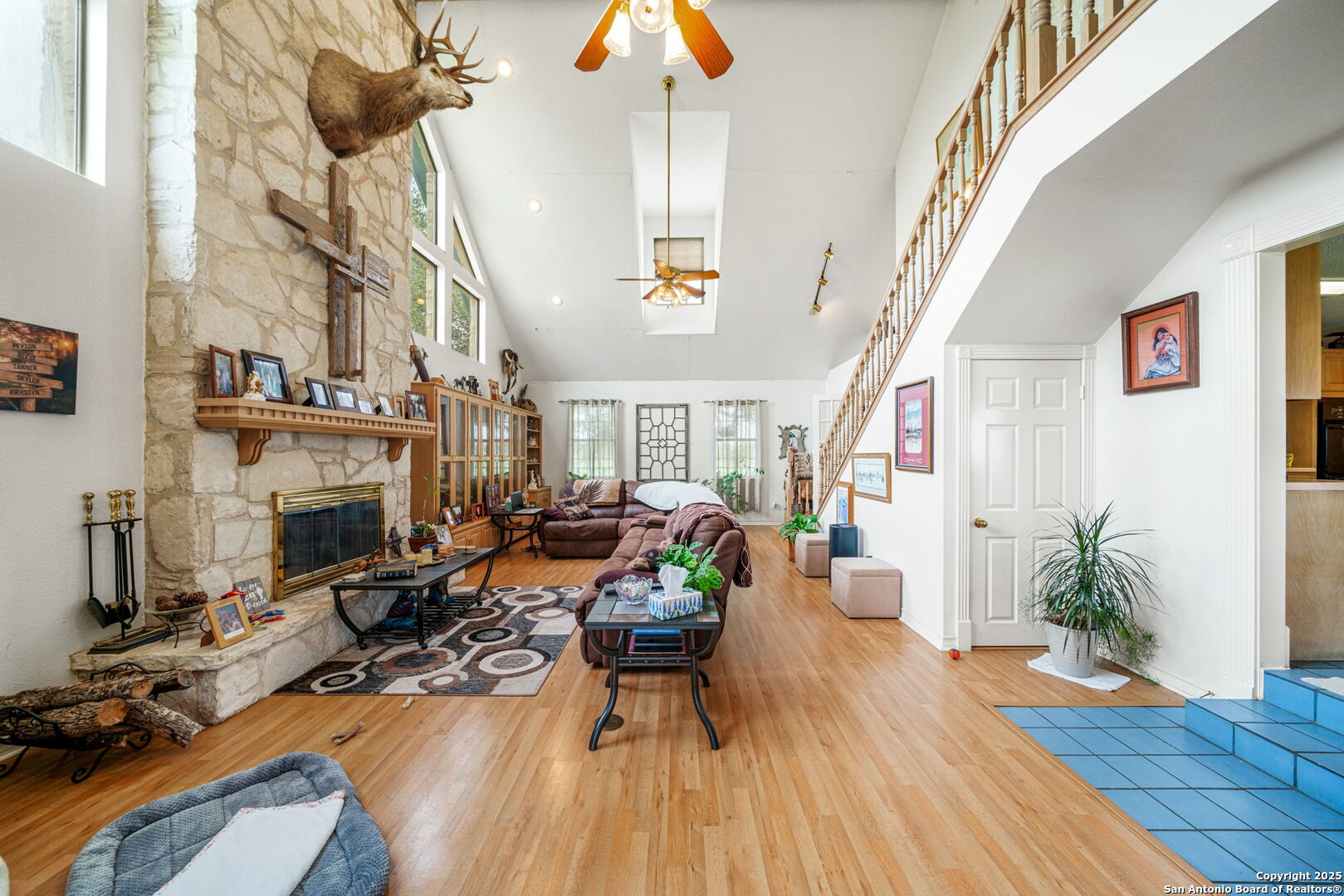 210 Tolle Road Cibolo, TX 78108 - Photo 10 of 61 a living room with fireplace furniture and a wooden floor