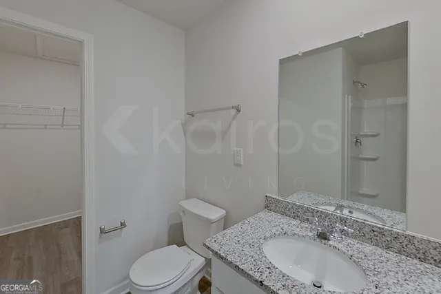 a bathroom with a sink and a toilet