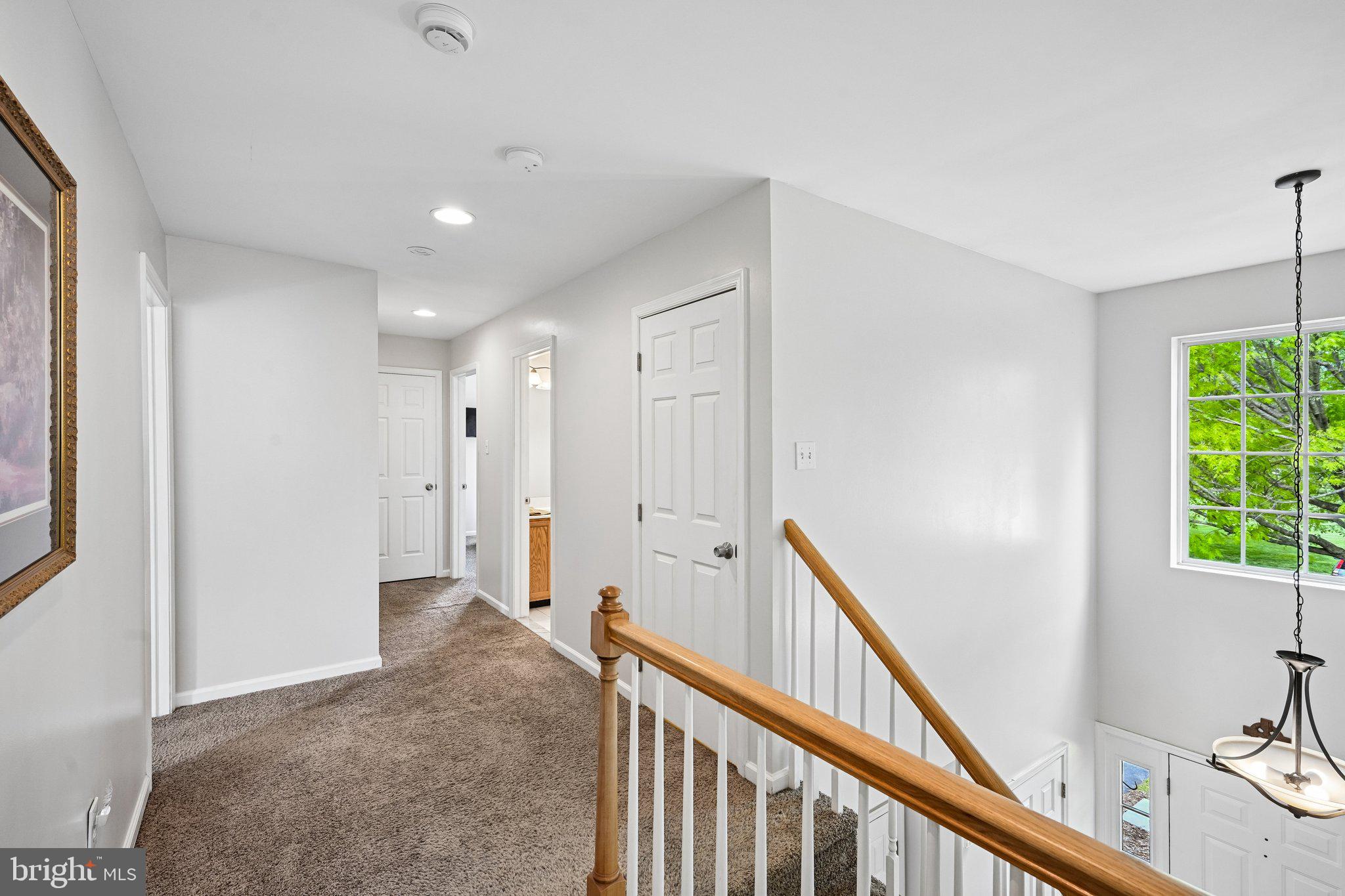 54 North Hawthorne Road Coatesville, PA 19320 - Photo 32 of 43 Bright and inviting upper hallway.