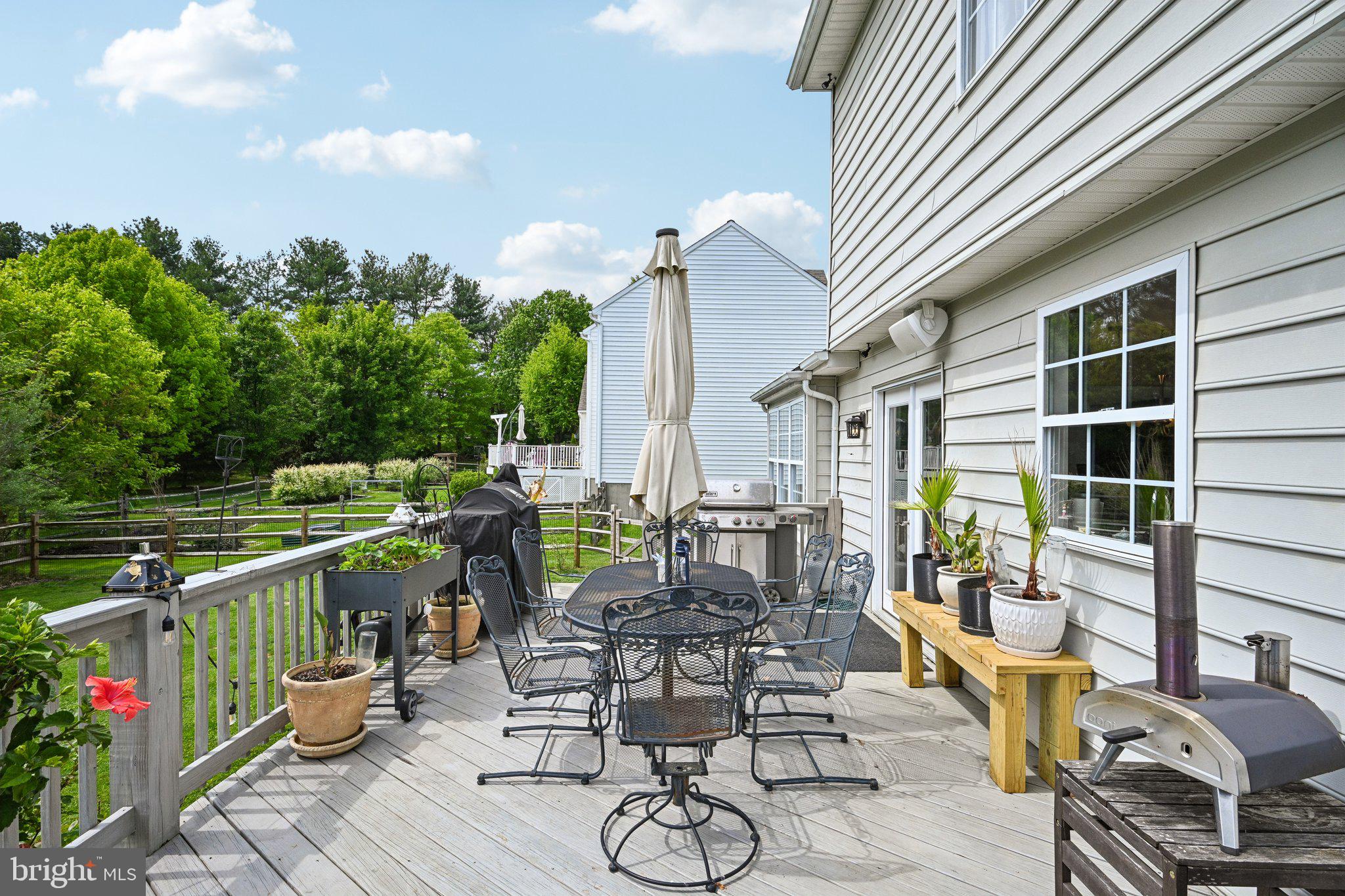 54 North Hawthorne Road Coatesville, PA 19320 - Photo 40 of 43 Serene deck with lush green views.