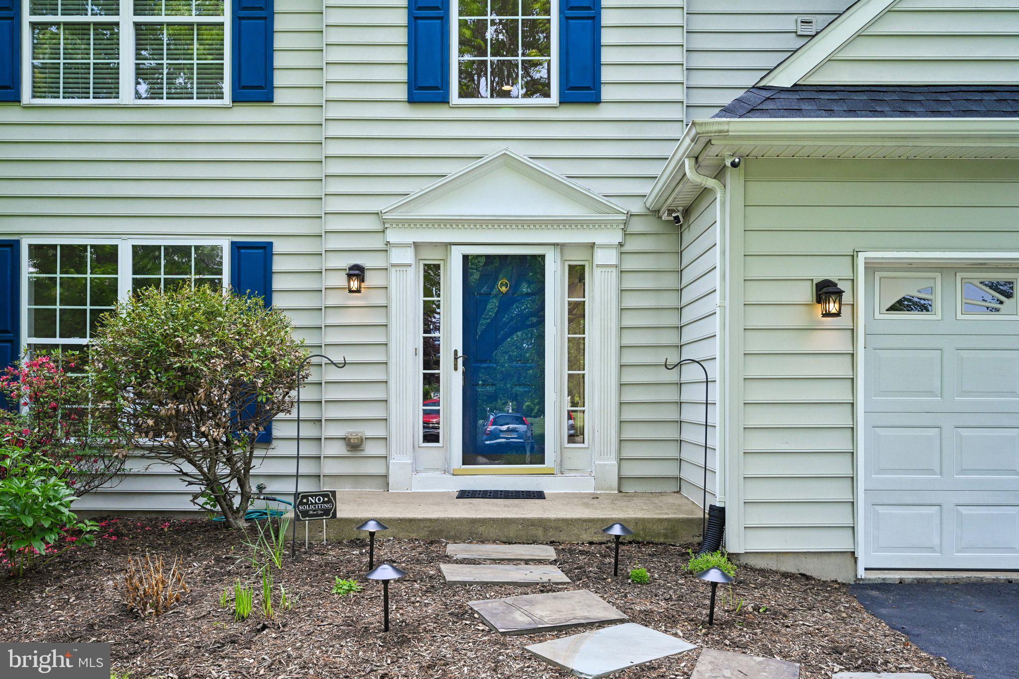 54 North Hawthorne Road Coatesville, PA 19320 - Photo 4 of 43 Charming entrance with vibrant blue door.