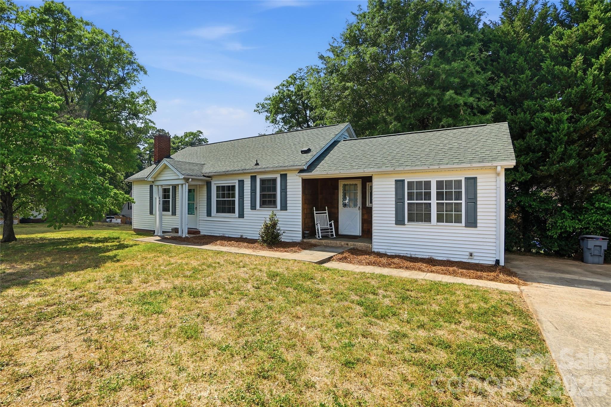 208 Jackson Terrace Clover, SC 29710 - Photo 1 of 30 a front view of a house with a yard