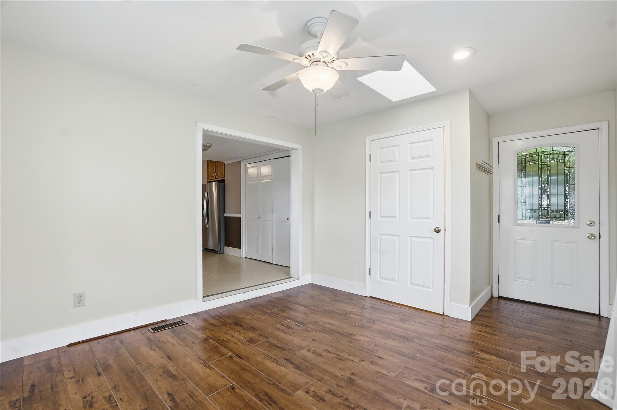 208 Jackson Terrace Clover, SC 29710 - Photo 16 of 30 wooden floor in an empty room with a window