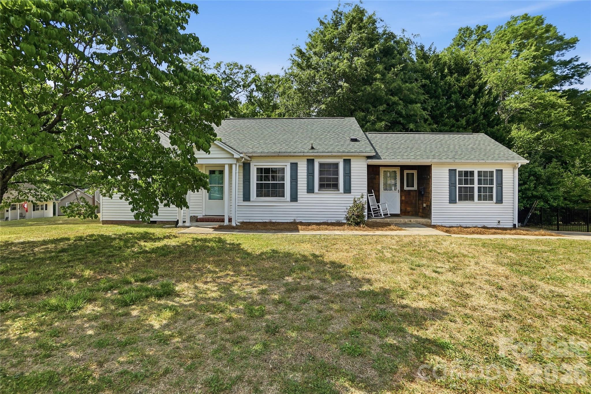 208 Jackson Terrace Clover, SC 29710 - Photo 2 of 30 a front view of a house with a garden