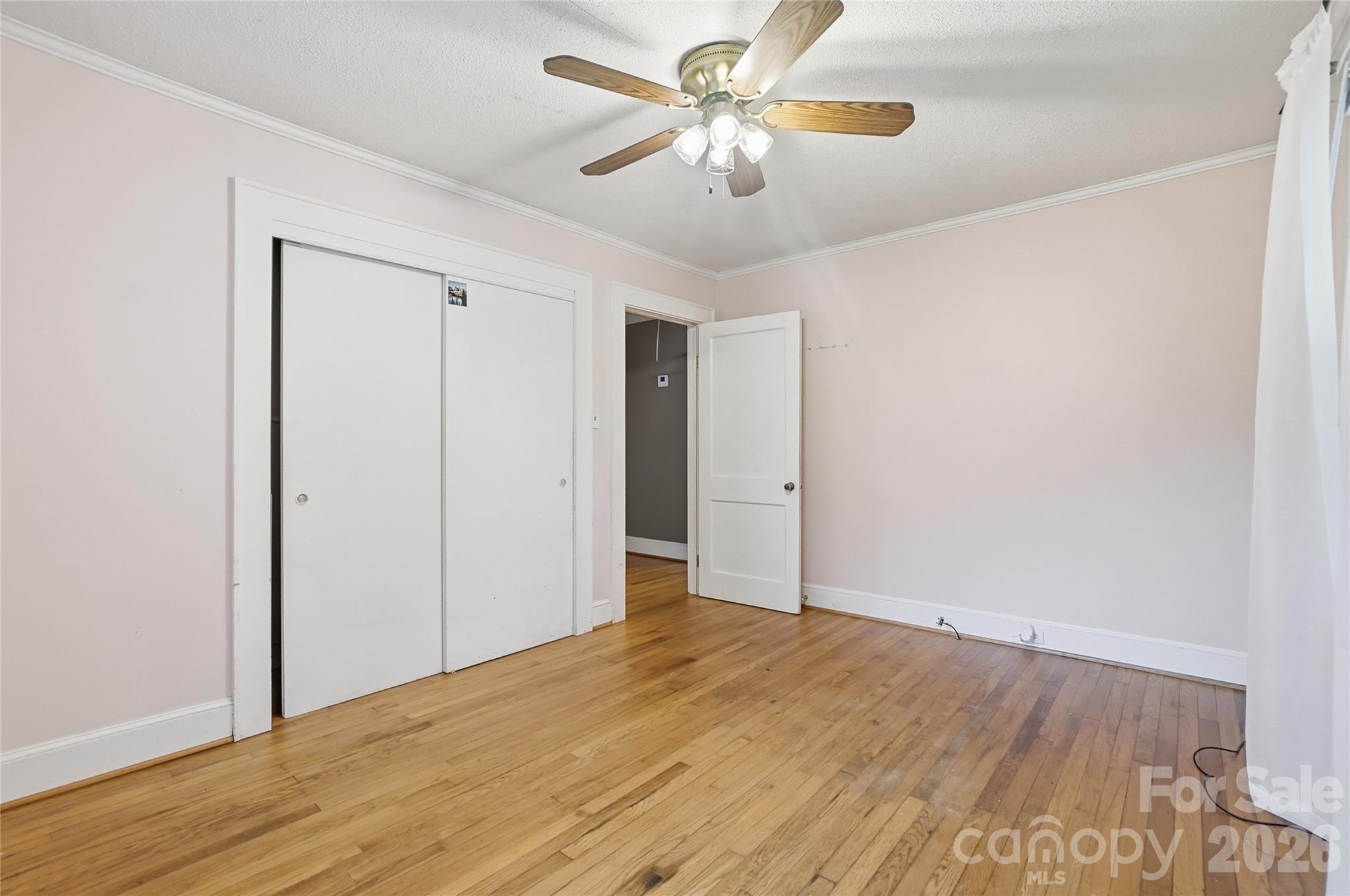 208 Jackson Terrace Clover, SC 29710 - Photo 25 of 30 a view of empty room with wooden floor