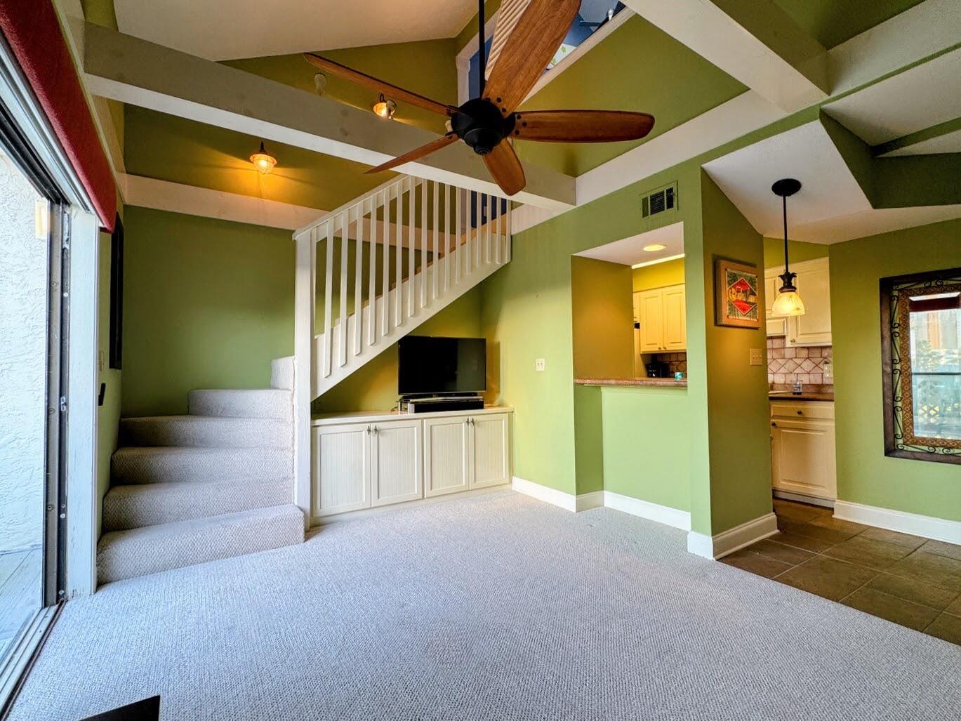 17614 Front Beach Road, Unit C13 Panama City Beach, FL 32413 - Photo 1 of 16 a view of hallway with washer and dryer