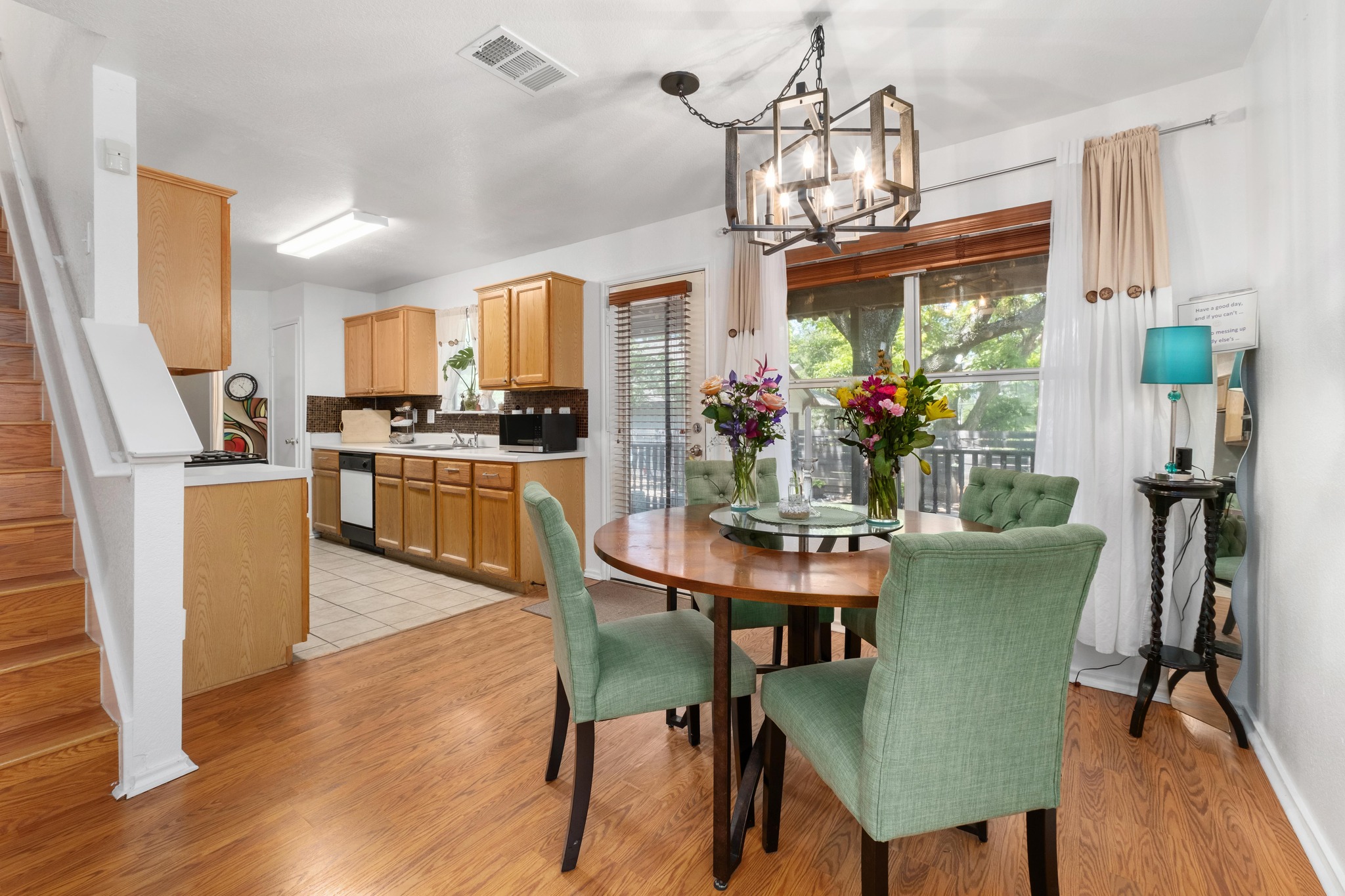 1184 Waller Street Austin, TX 78702 - Photo 4 of 19 a view of a dining room with furniture window and wooden floor