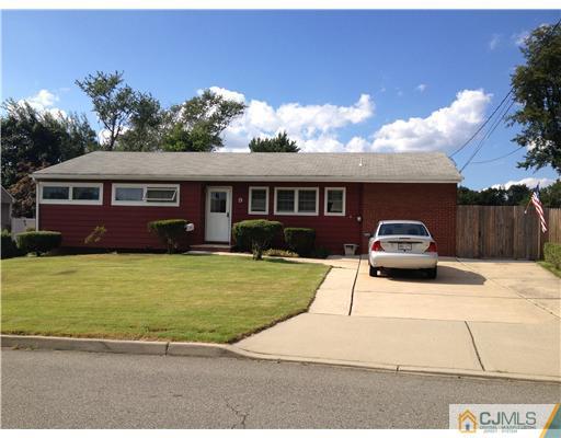 9 Clemson Road Old Bridge, NJ 08859 - Photo 1 of 10 a house view with a garden space