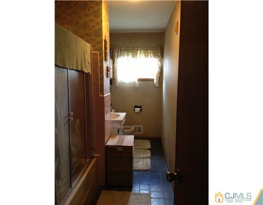 9 Clemson Road Old Bridge, NJ 08859 - Photo 8 of 10 a bathroom with a sink