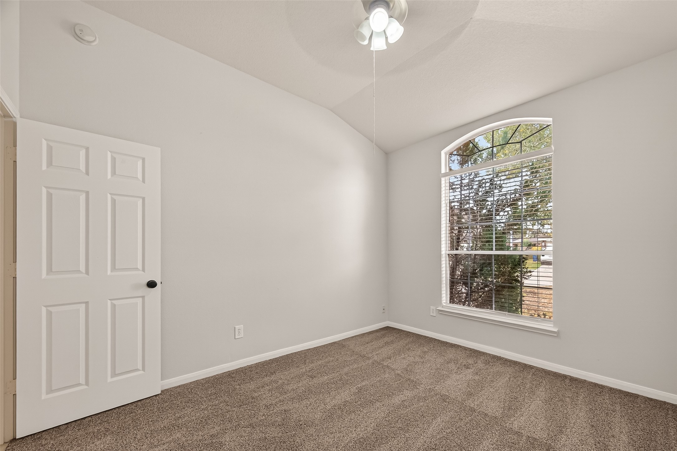 1918 Riane Lane Houston, TX 77049 - Photo 17 of 35 an empty room with windows