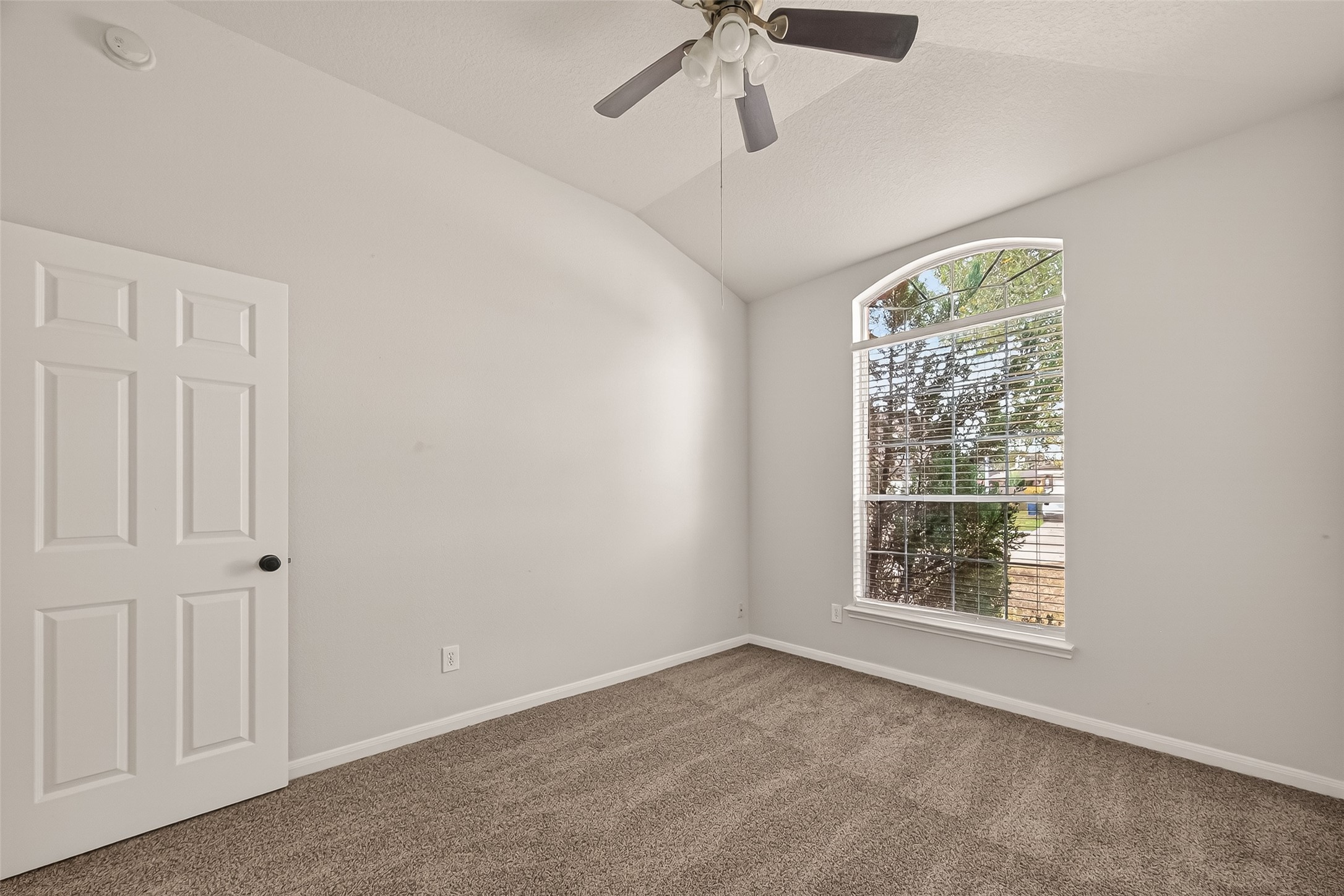 1918 Riane Lane Houston, TX 77049 - Photo 19 of 35 a view of an empty room with a window