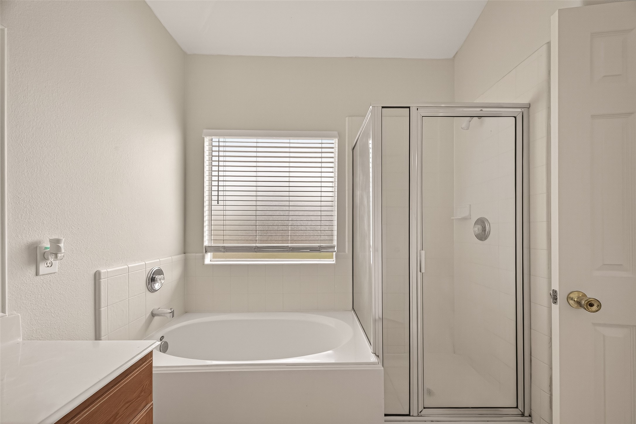 1918 Riane Lane Houston, TX 77049 - Photo 30 of 35 a white bath tub sitting next to a white sink