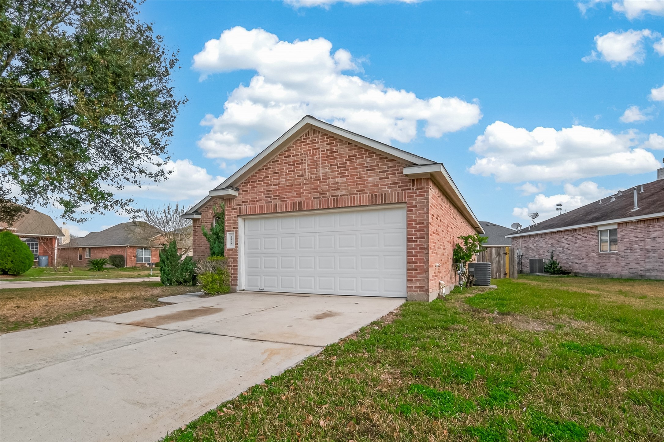 1918 Riane Lane Houston, TX 77049 - Photo 3 of 35 a front view of a house with garden
