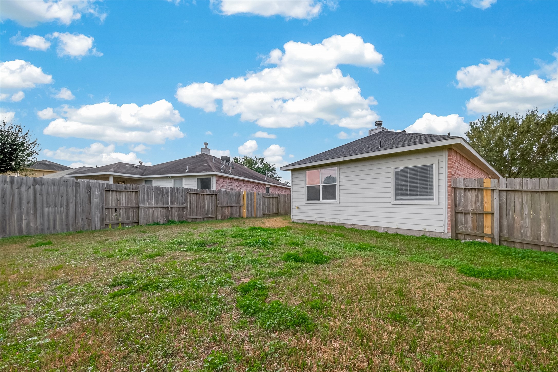 1918 Riane Lane Houston, TX 77049 - Photo 35 of 35 a view of a backyard with wooden fence