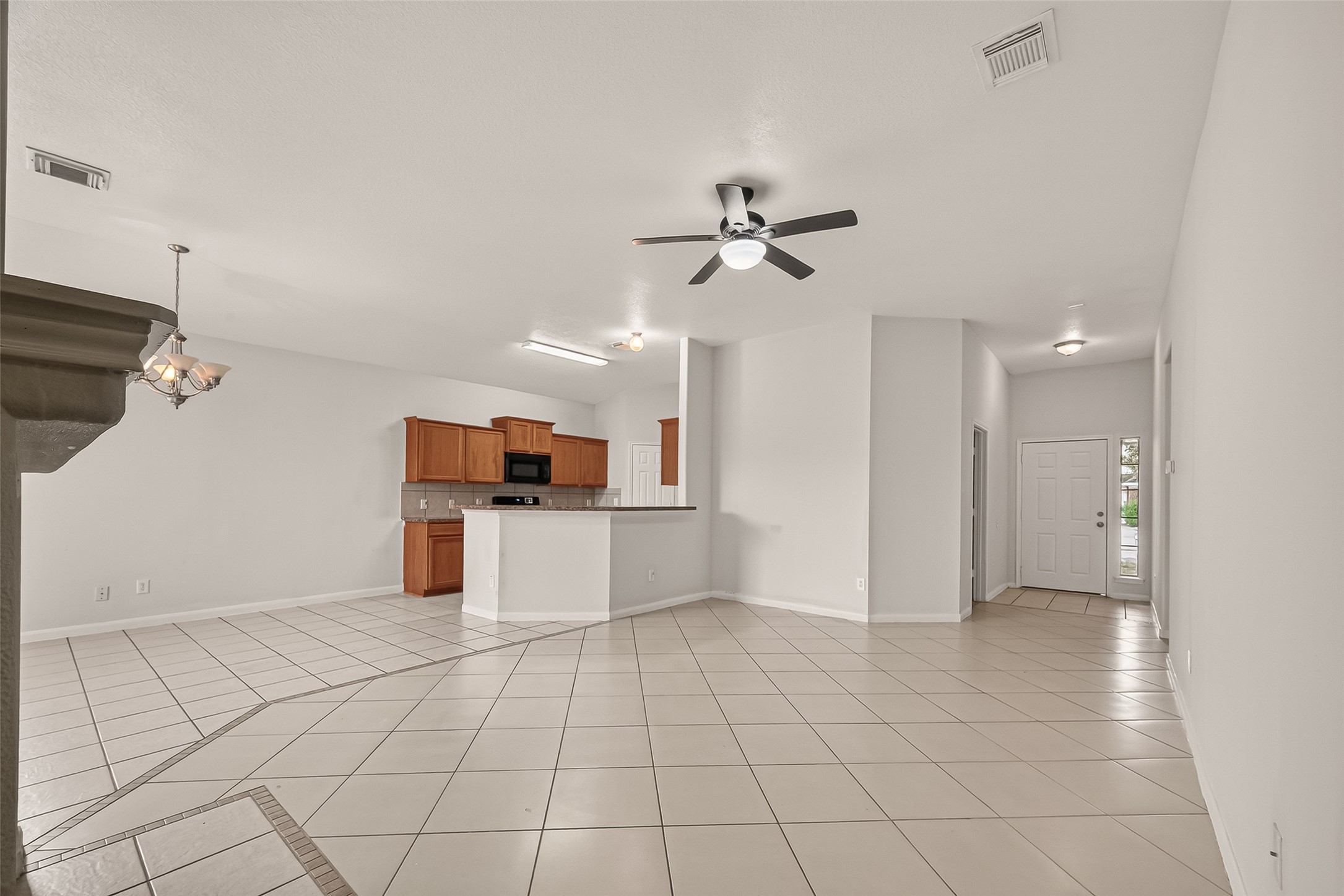 1918 Riane Lane Houston, TX 77049 - Photo 6 of 35 a view of kitchen with furniture and window