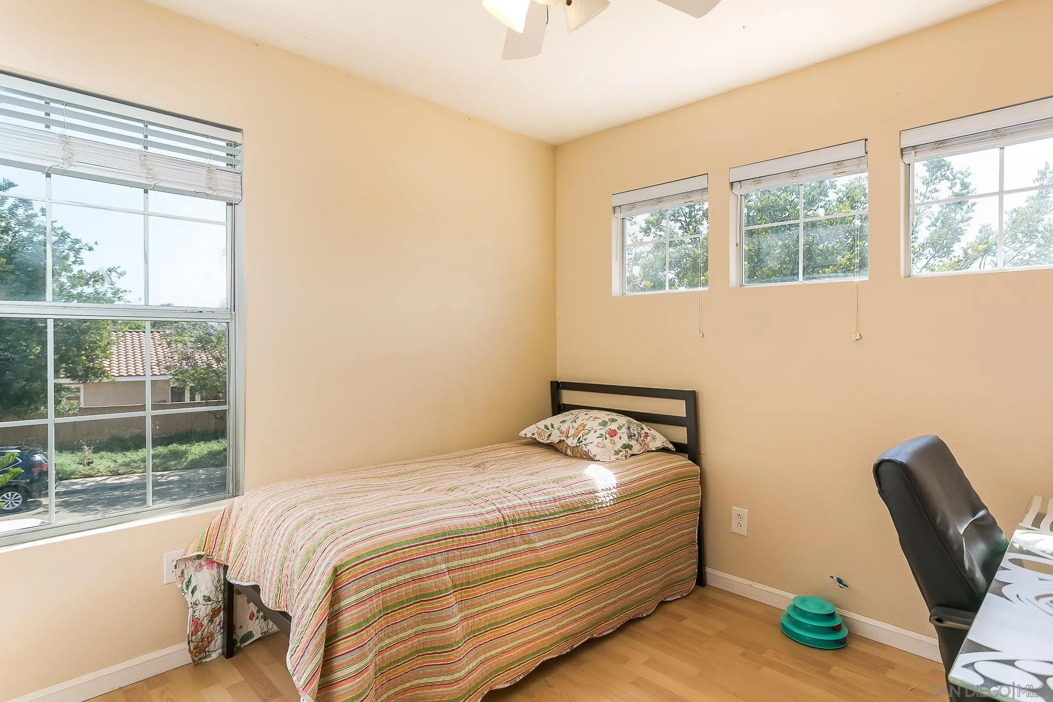 310 Cobblestone Place Santee, CA 92071 - Photo 18 of 32 a bedroom with a bed and a window
