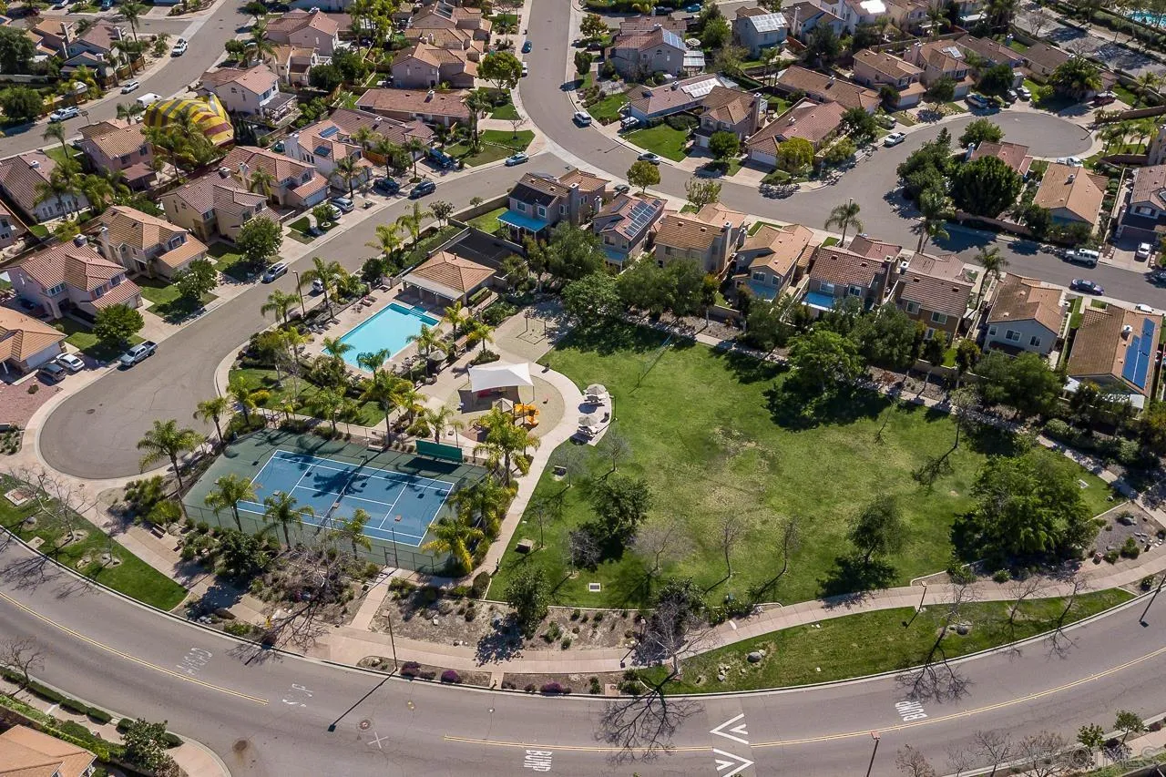 310 Cobblestone Place Santee, CA 92071 - Photo 28 of 32 an aerial view of a house with a yard and greenery
