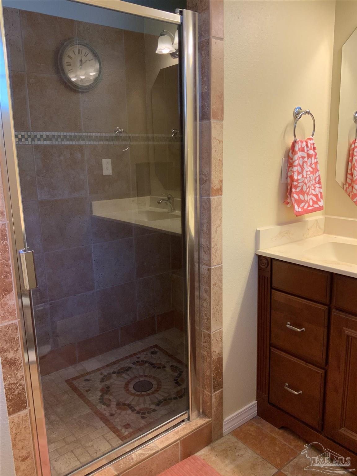 4867 Aleff Road Pace, FL 32571 - Photo 40 of 41 a bathroom with a shower and a sink
