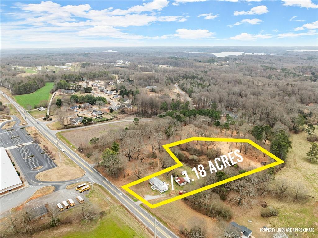 6860 Keith Bridge Road Gainesville, GA 30506 - Photo 1 of 1 a view of a swimming pool with a balcony