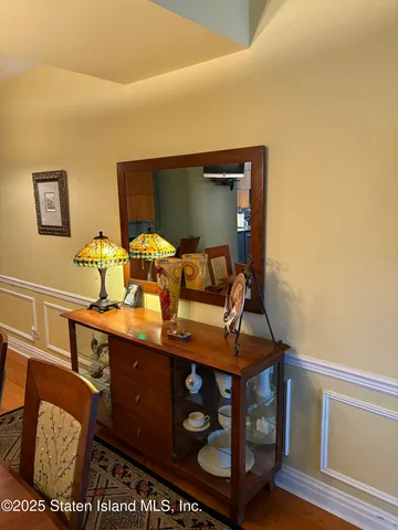 a view of staircase with rug