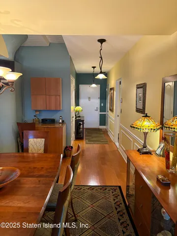 a room with projector and furniture