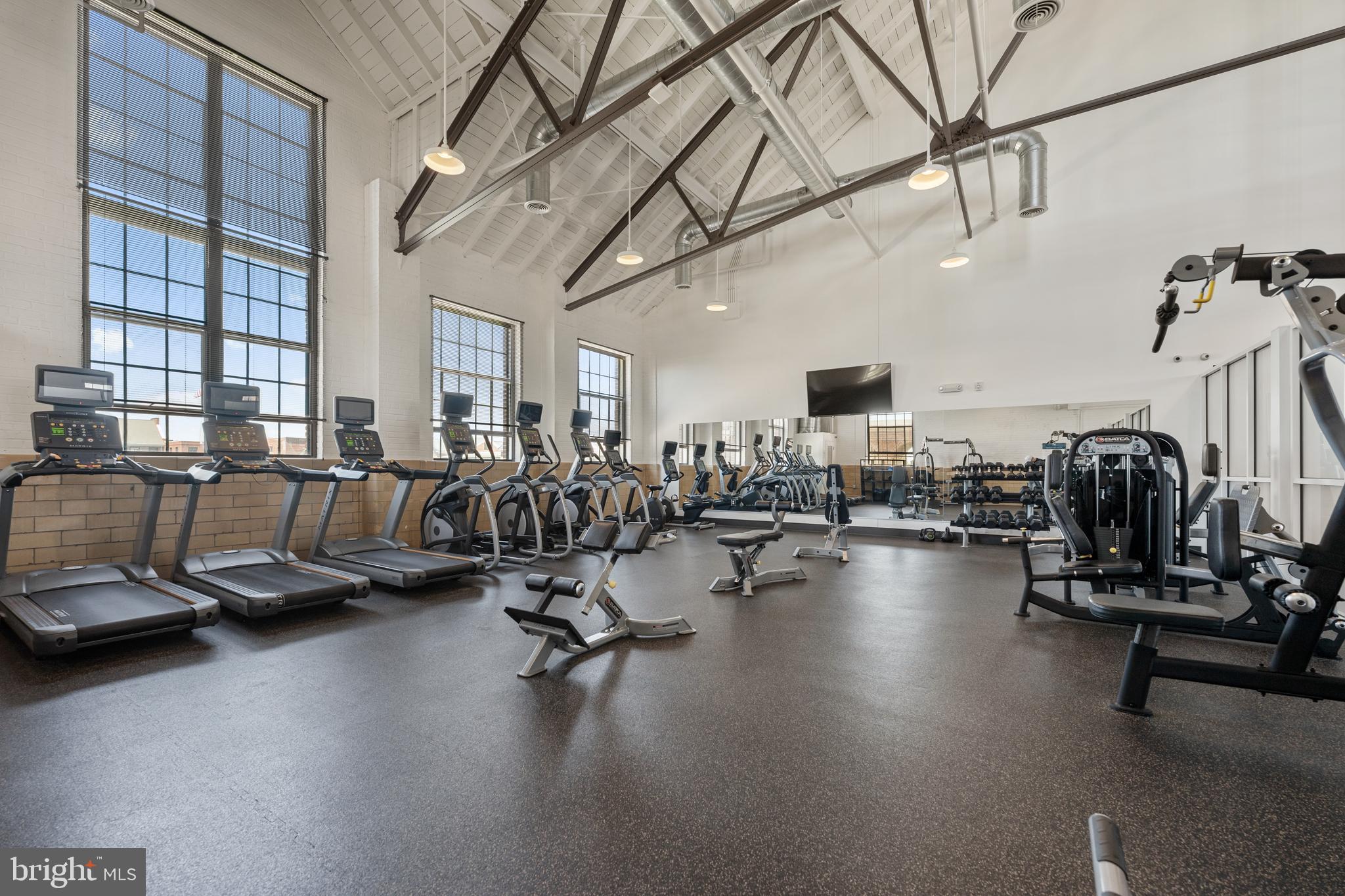 8459 Reformatory Way Lorton, VA 22079 - Photo 62 of 78 a view of a room with gym equipment