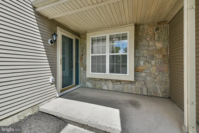 a front view of a house with a garage