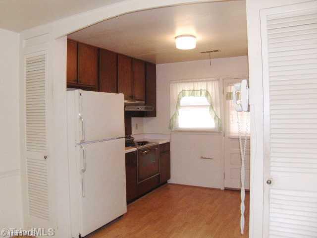 819 Runyon Drive High Point, NC 27260 - Photo 6 of 15 Kitchen. Another view into the kitchen note the arch doorway and the TWO pantries!