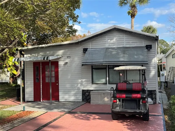 a front view of a house with patio