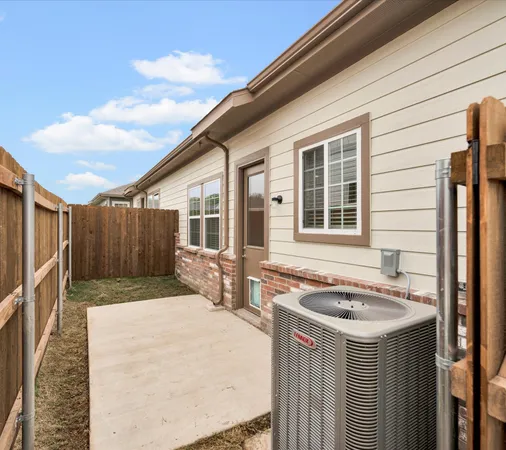 a house view with a backyard space