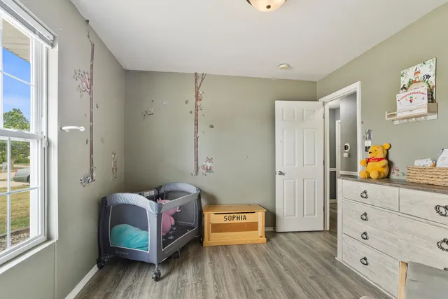 a bedroom with a bed and a closet