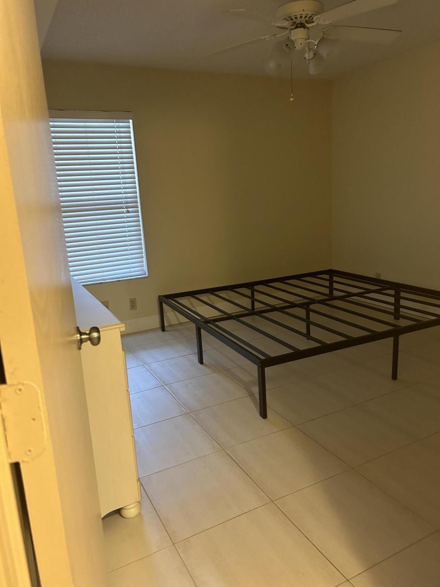 5701 Camino Del Sol, Unit 204 Boca Raton, FL 33433 - Photo 12 of 17 2ND BEDROOM, 12X12