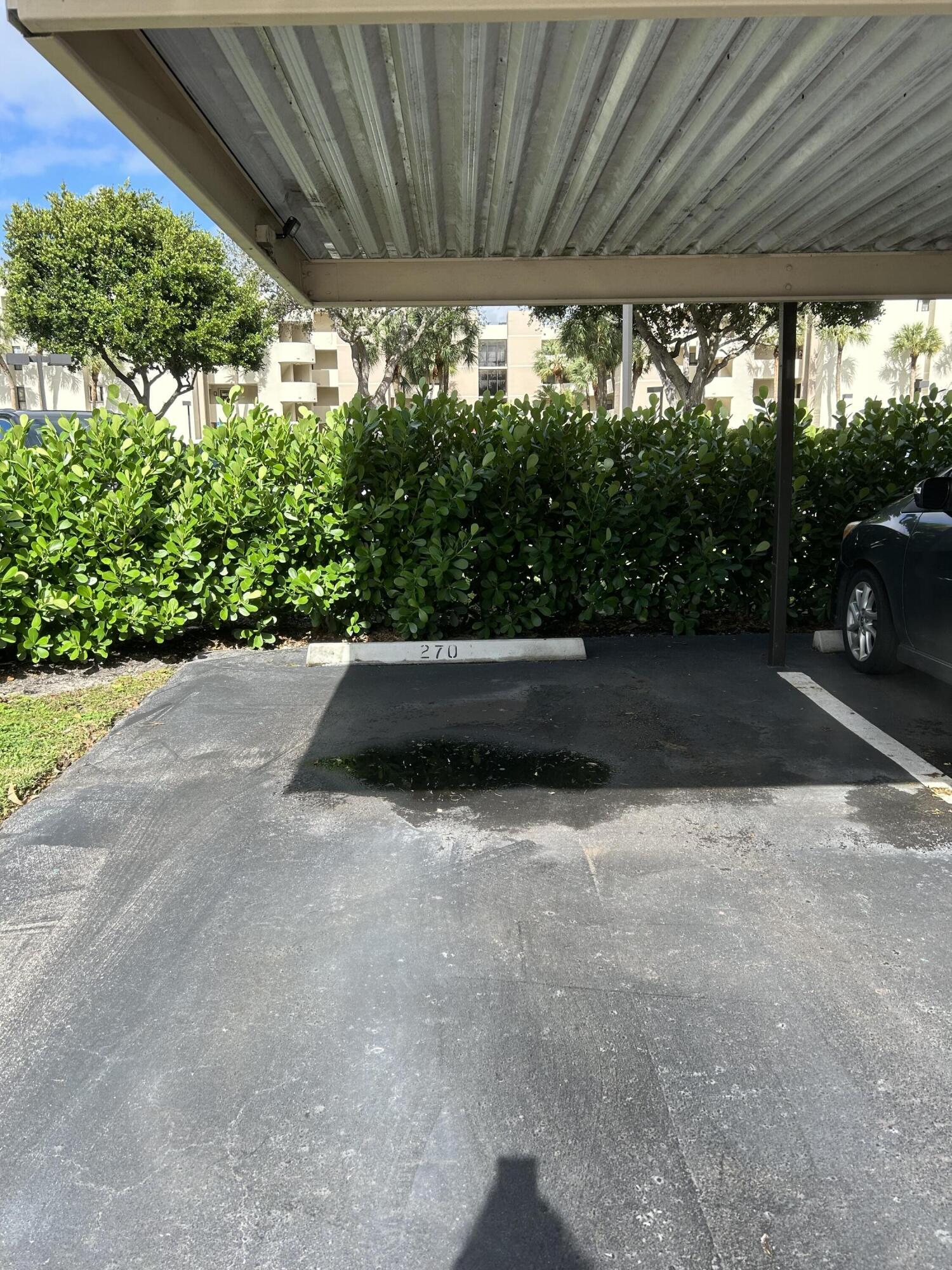 5701 Camino Del Sol, Unit 204 Boca Raton, FL 33433 - Photo 3 of 17 COVERED PARKING