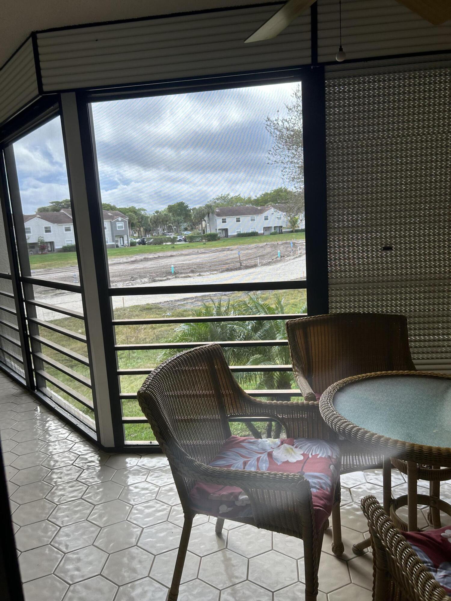 5701 Camino Del Sol, Unit 204 Boca Raton, FL 33433 - Photo 6 of 17 PATIO W/FURNITURE