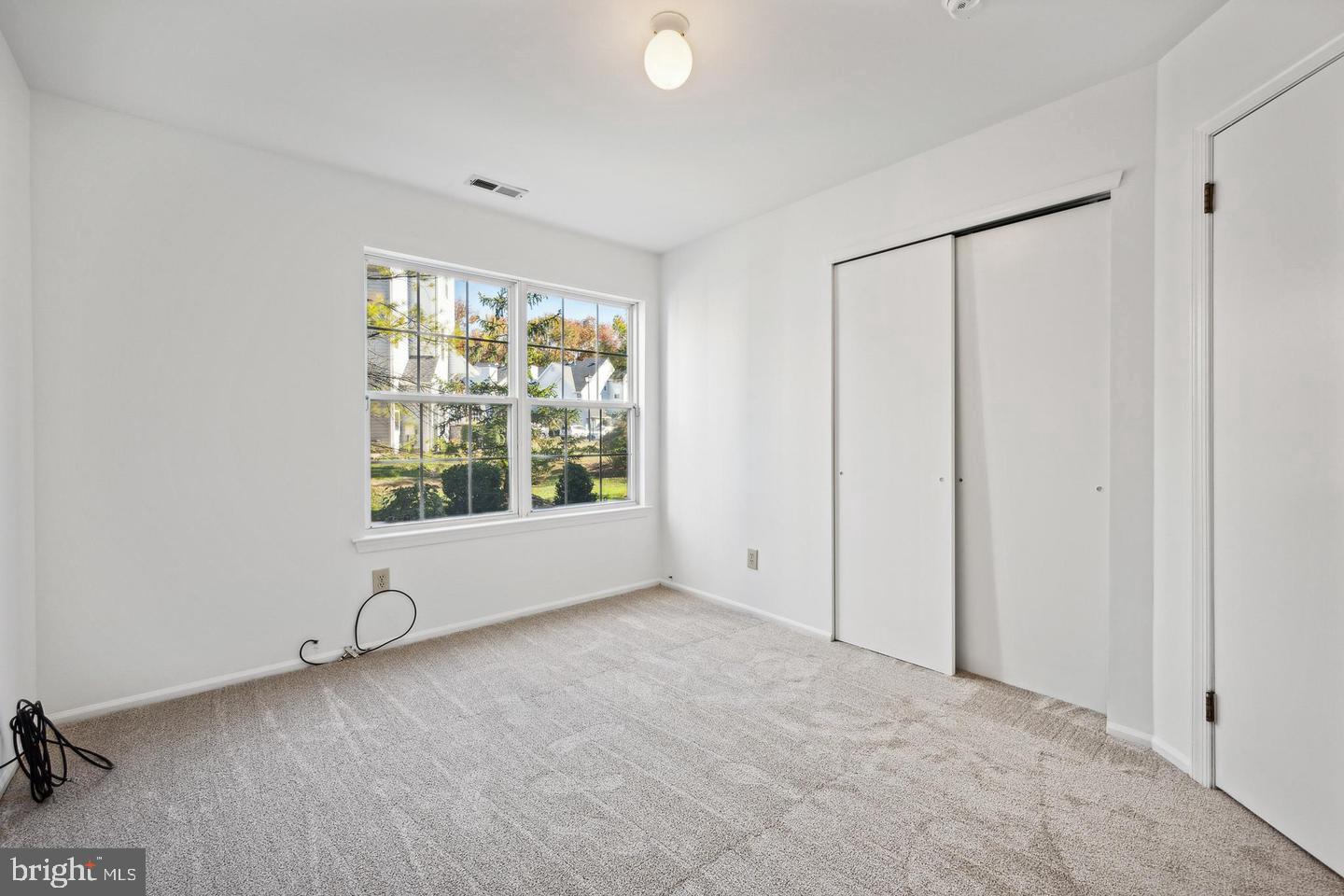 1107 Squirrel Road Marlton, NJ 08053 - Photo 16 of 24 a view of an empty room with a window