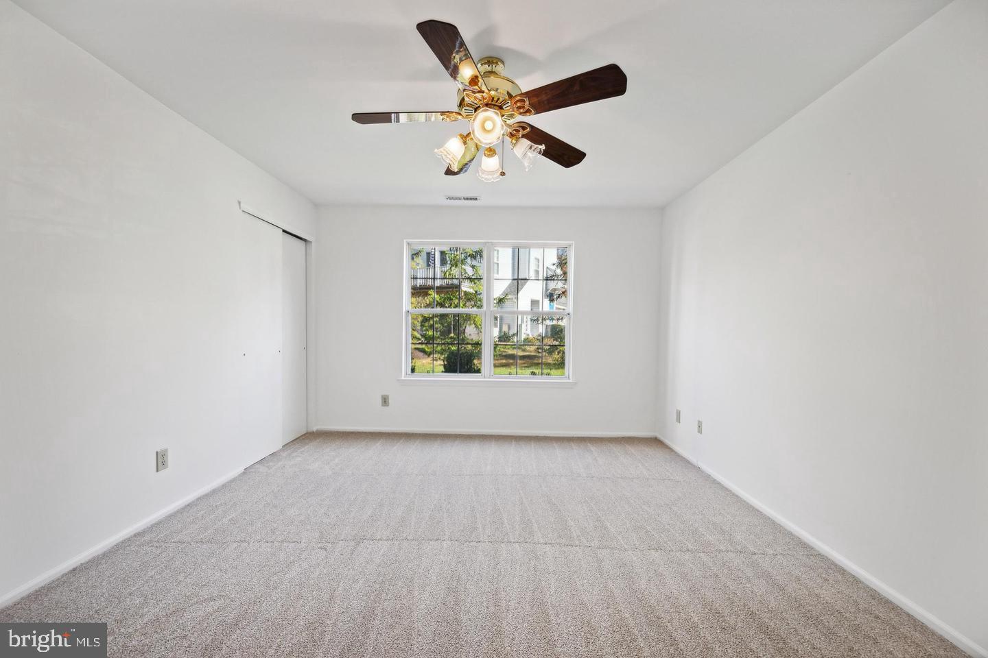 1107 Squirrel Road Marlton, NJ 08053 - Photo 17 of 24 wooden floor in an empty room with a window