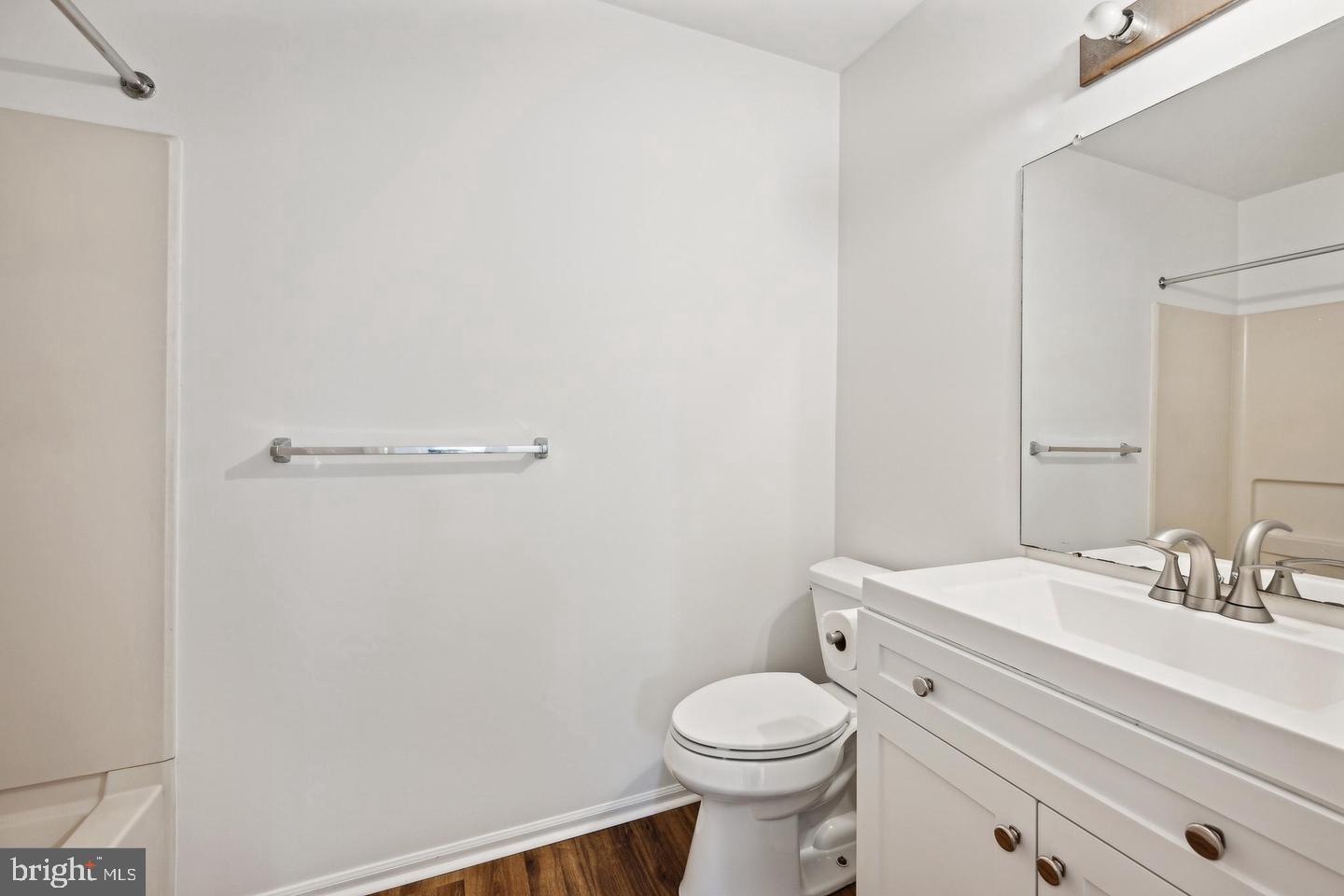 1107 Squirrel Road Marlton, NJ 08053 - Photo 20 of 24 a bathroom with a toilet a sink and shower